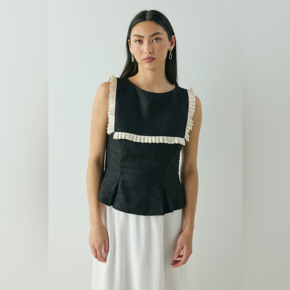 Sleeveless Black Blouse with Cream Pleated Trim